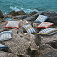 WELLERMAN STRIPED DECORATIVE PILLOW IN CORAL